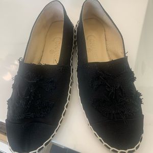 Chanel black distressed slip on